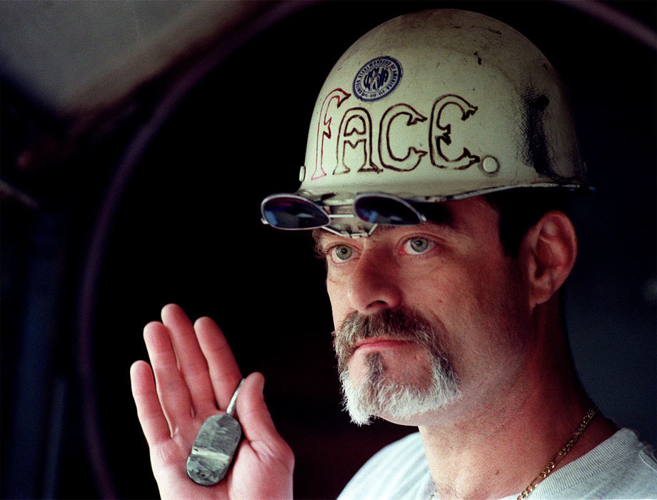 First Place, Ohio Understanding Award - Mike Levy / The Plain DealerJune 16, 2001, Scot  Reppa, 44, worked at LTV since he was 19 worked the last heat at LTV's westside slab. He holds a 'lollipop', a sample taken from the last heat from the plant. 