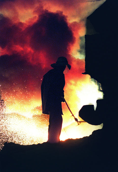 First Place, Ohio Understanding Award - Mike Levy / The Plain DealerSteel worker inside blast furnace, Severstal.