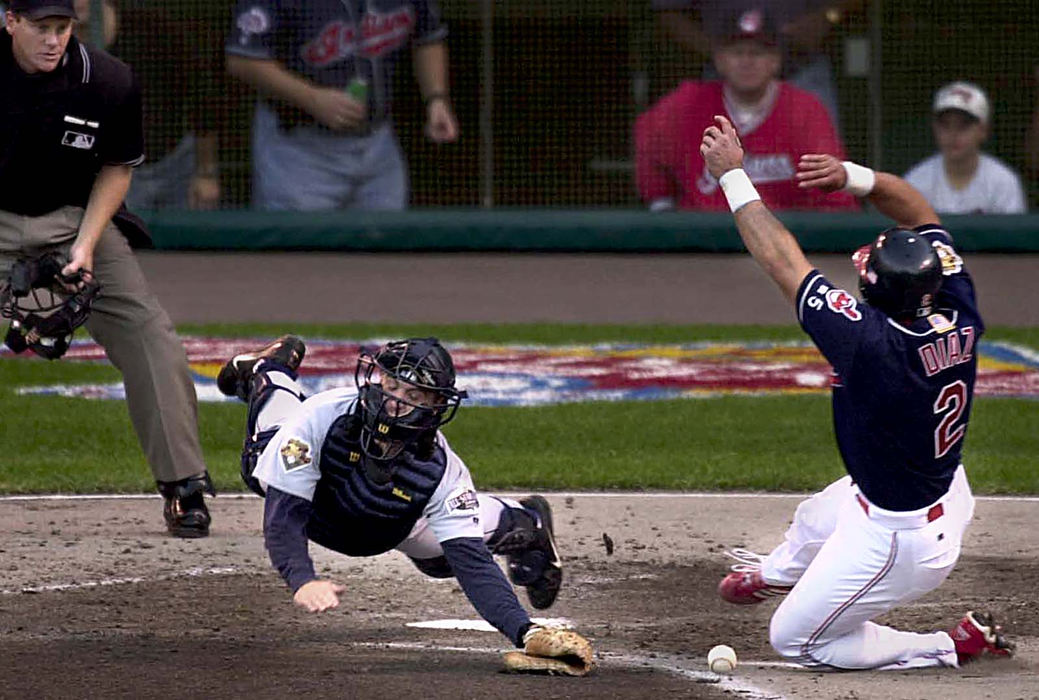 First Place, Photographer of the Year - Mike Levy / The Plain DealerDivision series playoff action, Cleveland vs. Seattle.  