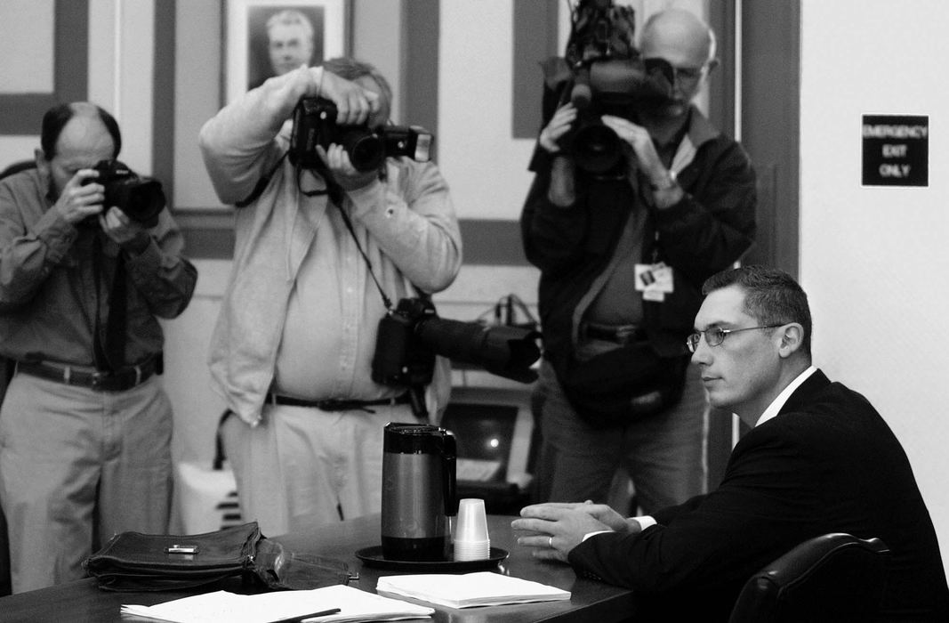 Third Place, Photographer of the Year - Michael E. Keating / Cincinnati EnquirerBlaine Jorg is photographed as he sits in the courtroom awaiting trial.  The media interest in the police oficer charged in the choking death of Roger Owensby, Jr. was intense.  The trial held public interest.