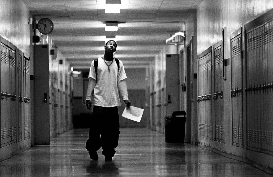 Second Place, Photographer of the Year - Steven M. Herppich / Cincinnati EnquirerHallway Day Dreamer- Sophomore Darryn Thompson walks the halls during class at Robert A. Taft High School in the West End.