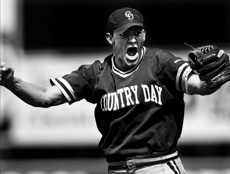 Second Place, Photographer of the Year - Steven M. Herppich / Cincinnati EnquirerTop of the World-Cincinnati Country Day High pitcher Brett Smith reacts after striking out the final batter from Ottawa Hills High School to win the Division IV State Championship at Cooper Stadium in Columbus, June 2, 2001. Smith struck out six batters in two innings helping his team win the game 4-2. 