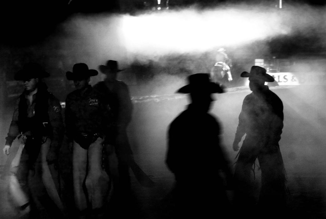 Second Place, Photographer of the Year - Steven M. Herppich / Cincinnati EnquirerLord's of the Ring-Cowboys leave the arena after being introduced at the beginning the 3rd Annual World's Toughest Bulls & Broncs event at the First Star Center. 