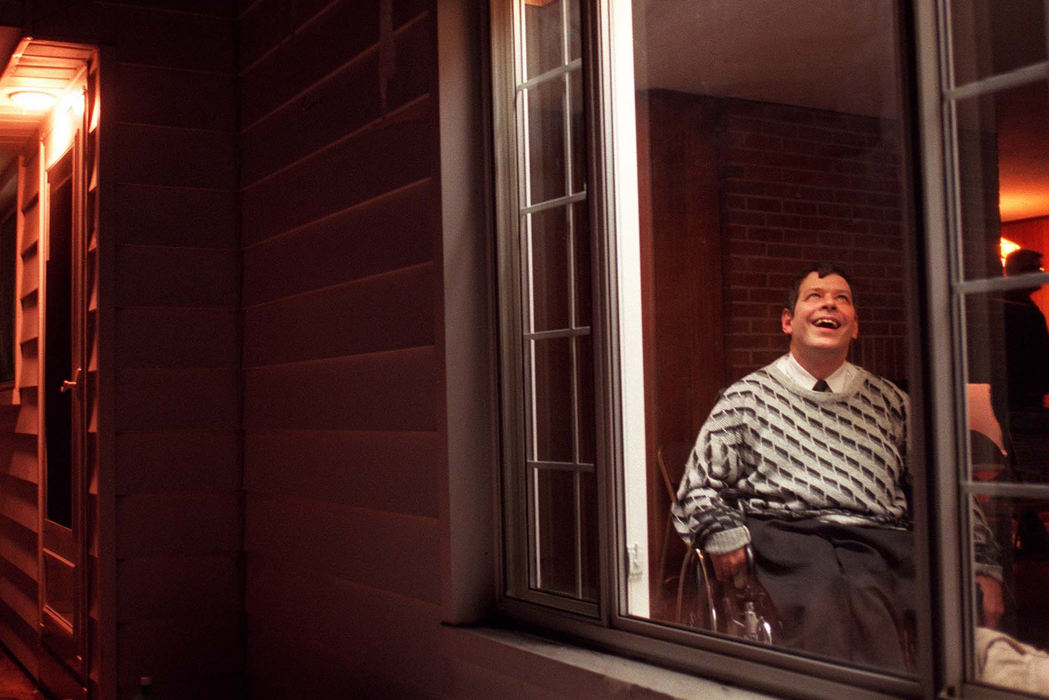 First Place, Photographer of the Year - Mike Levy / The Plain DealerA month before the Westlake house is completely refitted with ramps and grip bars and wheelchair-friendly doors, Tim Milkovich scans the picture window that will frame his wider world.  