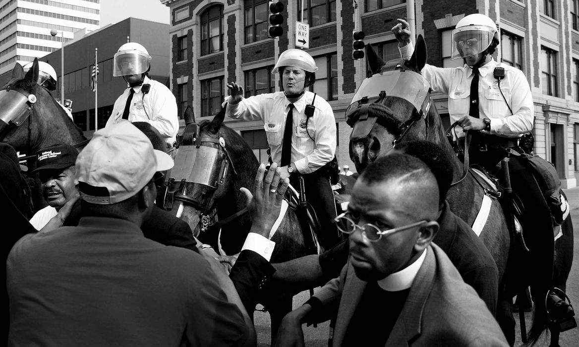 Second Place, Photographer of the Year - Steven M. Herppich / Cincinnati EnquirerMounted Police push protestors back from Central Parkway and Race Street Wednesday afternoon. The group started a march from the sight of the shooting of Timothy Thomas on Republic and 13th Street and was stopped before reaching the downtown area.