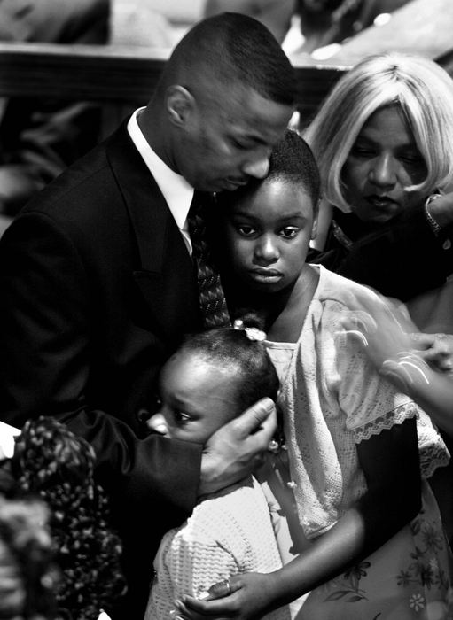 Second Place, Photographer of the Year - Steven M. Herppich / Cincinnati EnquirerFamily members say farewell at the funeral of Timothy Thomas at Prospect Baptist Church on Elm Street in Over-the-Rhine, April 15, 2001. Timothy Thomas was fatally shot last weekend by Cincinnati Police officer Stephen Roach.