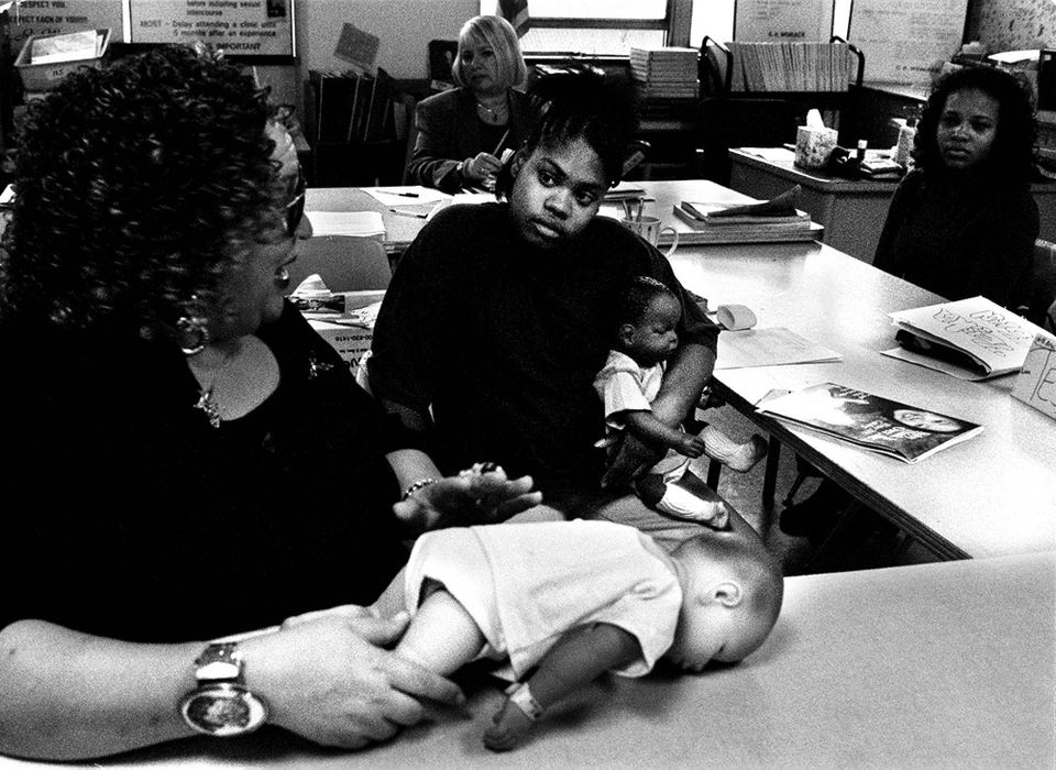 Second Place, Photographer of the Year - Steven M. Herppich / Cincinnati EnquirerYolanda Battles, 15, listens to Mrs. Womack during her parenting class at Robert A. Taft High School in the West End. Yolanda is 6 months pregnant and will have her baby during the school year in February. 