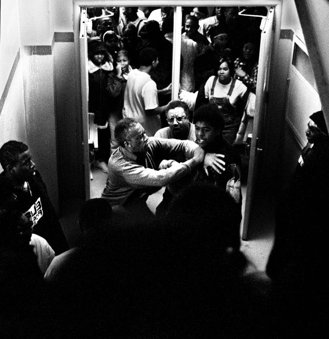 Second Place, Photographer of the Year - Steven M. Herppich / Cincinnati EnquirerSubsitute teacher Robert Rollinson and security guard Stan Cash pull Dezmond Knaff away from Josh Jacobs during a fight in the stairway of Robert A. Taft High School in between classes Thursday morning. Both boys were suspended for ten days because of the altercation. Josh Jacobs, who was in Ms. Houck's 9th/10th grade English class never returned to school and dropped out.