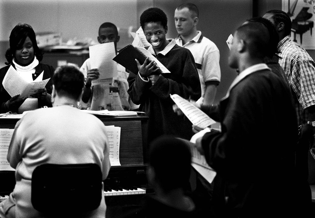 Second Place, Photographer of the Year - Steven M. Herppich / Cincinnati EnquirerJohnny Watson smiles during choir class at Robert A. Taft High School in the West End. Johnny passed Sandy Houck's class.