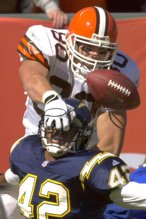 Second Place, Sports Action - Mark Duncan / Associated PressCleveland Browns tight end Aaron Shea (80) grabs the face mask of San Diego Chargers' Rogers Beckett (42) trying for a pass in the end zone during the second quarter, Oct. 7, 2001, in Cleveland. Shea couldn't handle the pass and was penalized for the face mask.