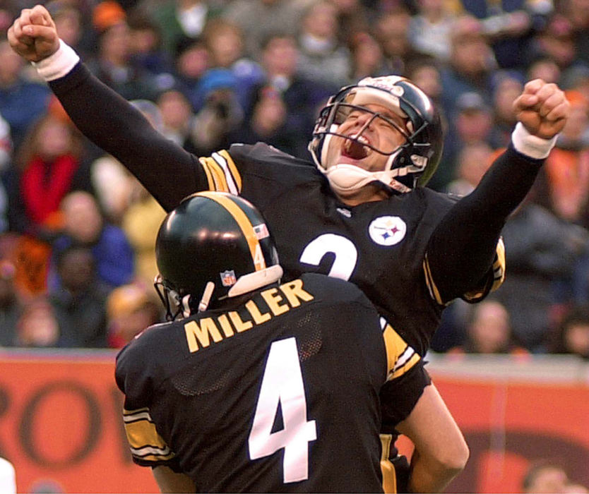 Award of Excellence, Sports Feature - John Kuntz / The Plain DealerPittsburgh Steelers kicker Kris Brown celebrates with holder Josh Miller after Brown kicked a field goal in overtime to defeat the Cleveland Browns 15-12 at Cleveland Browns Stadium November 11, 2001.   