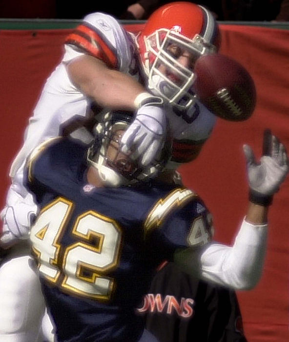 Second Place, Student Photographer of the Year - Greg Ruffing / Kent State UniversityCleveland Browns tight end Aaron Shea (back) reaches for a touchdown pass over San Diego Chargers defender Rogers Beckett during the first quarter of the Browns 20-16 victory. The pass was incomplete and Shea was called for a face mask penalty on the play, forcing the Browns to settle for a field goal on the drive.