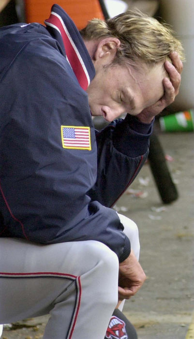 Second Place, Sports Picture Story - Chuck Crow / The Plain DealerAfter waiting 15 years to get back to the postseason, the Tribe's Chuck Finley got off to a rocky start, allowing four first-inning runs. Finley and the Indians never recovered, losing the game 5-0.  The Indians lost the divisional playoff series to the Seattle Mariners 3 games to 2. Once again, maybe next year.