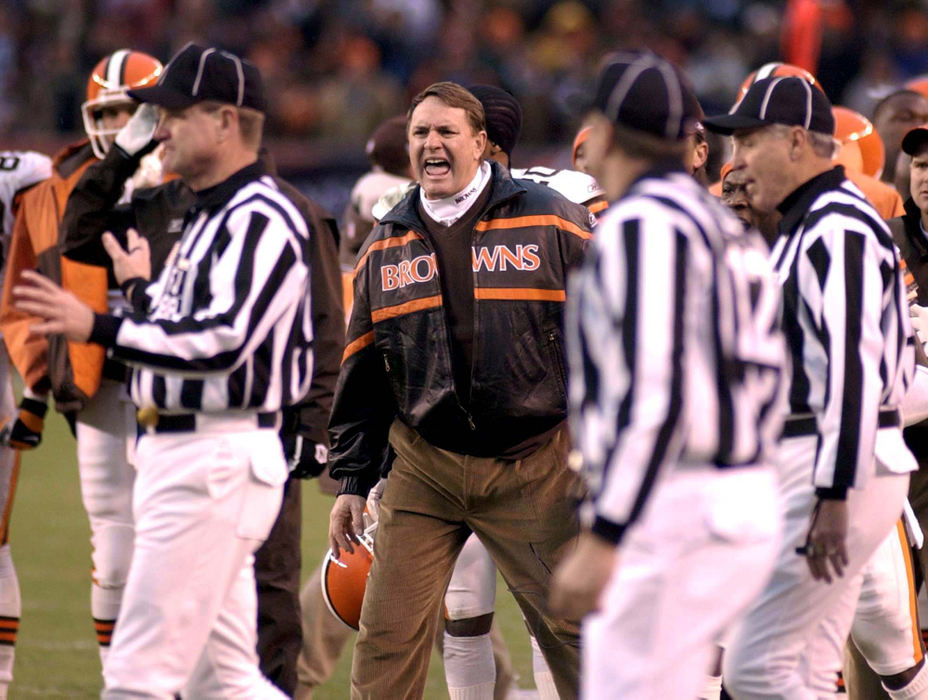 First Place, Sports Picture Story - Scott Heckel / The RepositoryCleveland Browns head coach Butch Davis yells at game officals as they were about to reverse a call they made on what appeared to be a first down catch by Quincy Moran as Cleveland was driving late in the fourth quarter of their game with Jacksonville. At left is field judge Scott Steenson. 