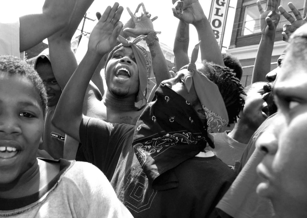 First Place, Team Picture Story -  / Cincinnati EnquirerProtestors gather in front of New Prospect Baptist Church on Elm Street, April 14, 2001. Timothy Thomas was fatally shot last weekend by a Cincinnati Police officer. 