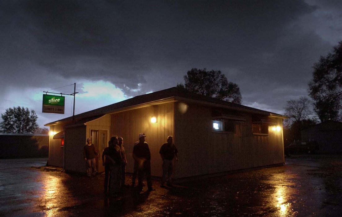 Second Place, News Picture Story - Allan Detrich / The BladePatrons of Stiney's 3 Oaks bar on second Street in Tiffin watch a tornado form in the south part of town.