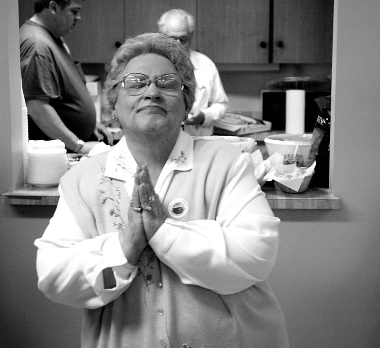 Third Place, News Picture Story - Monique Ganucheau / Medina GazetteElection night, Joyce Farnsworth thanks god after winning the majority in the first 10 precincts at the Medina County Home.