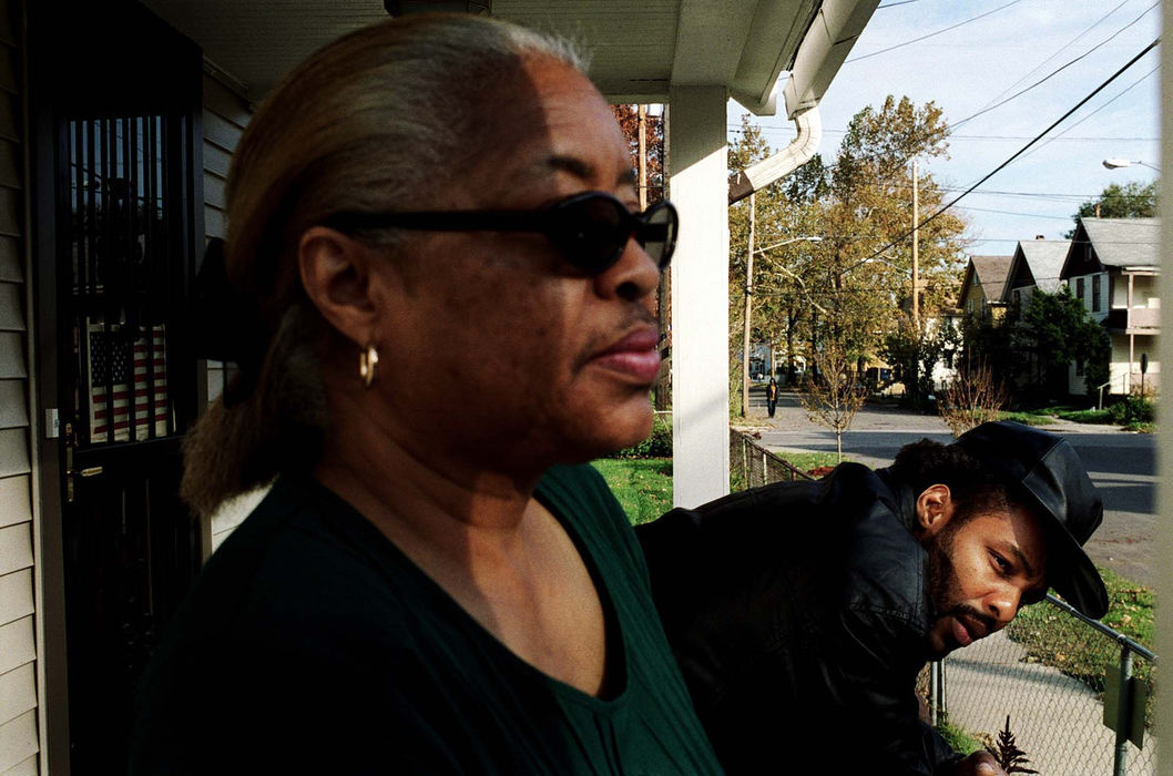 Award of Excellence, News Picture Story - Eustacio Humphrey / The Plain DealerAnnie Mandell stands next to her son Anthony Michael Green on her front deck. Mrs. Mandell always believed in her son's innocence throughout the years while he was still incarcerated. Tension grew between Michael and his mother over their different lifestyles. "I grew up here in Hough, and everyone remembers the old Michael," he said.