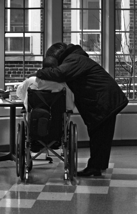 First Place, Ohio Understanding Award - Ed Suba, Jr. / Akron Beacon JournalFacing another day of physical therapy and strange faces, Leroy gets an affectionate hug during a visit from his grandmother, Pat Sutton, during his stay at the Cleveland Clinic Children's Hospital for Rehabilitation.