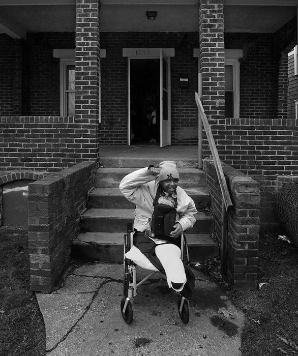 First Place, Ohio Understanding Award - Ed Suba, Jr. / Akron Beacon JournalAfter two extended hospital stays, several operations, numerous physical and occupational therapy sessions, pain, loneliness and fear, Leroy Sutton cheers as he finally returns to his Akron home for the first time since the accident.