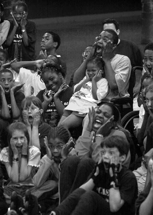 First Place, Ohio Understanding Award - Ed Suba, Jr. / Akron Beacon JournalLeroy and his fifth grade classmates from Case Elementary school can't resist mugging for the camera while attending the annual class roller skating party at Rocky's Skating Center in Tallmadge.