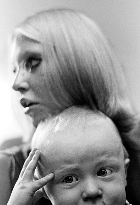 Second Place, Ohio Understanding Award - James M. Patterson / Ohio UniversityIn the arms of his 17-year-old mother, Nicholas holds his head where it has recently been bumped.