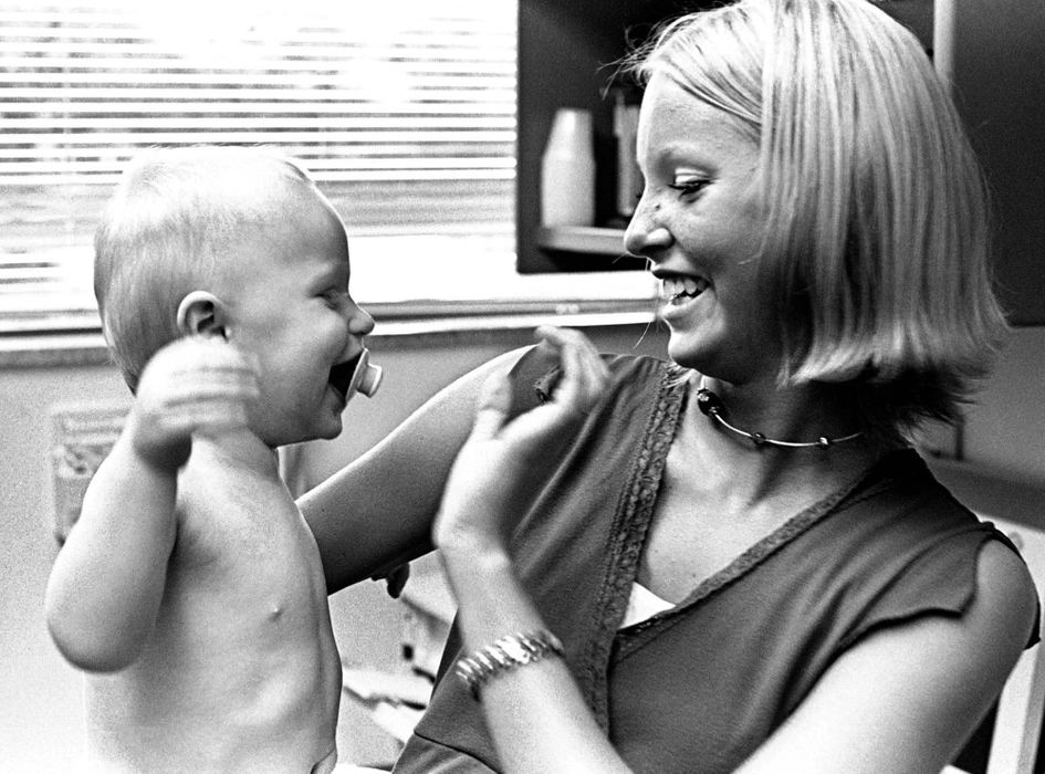 Second Place, Ohio Understanding Award - James M. Patterson / Ohio UniversityNicholas is all smiles when his mother gives him his pacifier.