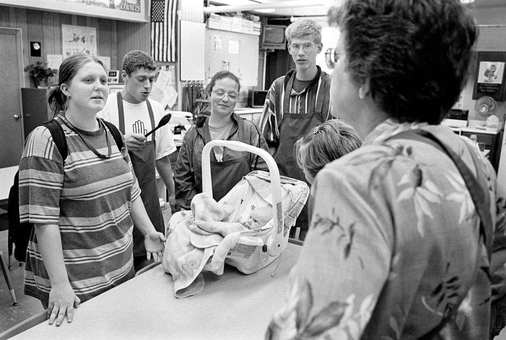 Second Place, Ohio Understanding Award - James M. Patterson / Ohio UniversitySix weeks after giving birth to her daughter Apria Lynn Jones, Rio Conley returns to school. After her classes she stops in to introduce Apria to Pam Kemmenoe's Family and Consumer Sciences class.