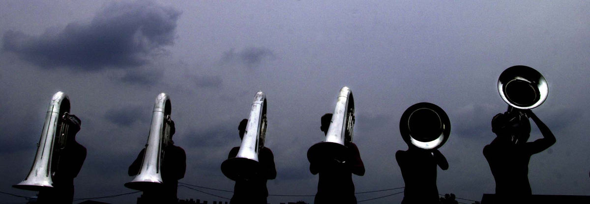 First Place, Pictorial - Tony Jones / The Cincinnati EnquirerMembers of the Cadets of Bergen County New Jersey Drum and Bugle Corps raise the tubas in secession During at practice before performing at the Fair Field Stadium in the Drum and Bugle Corps Extravaganza on July 13,2002.  