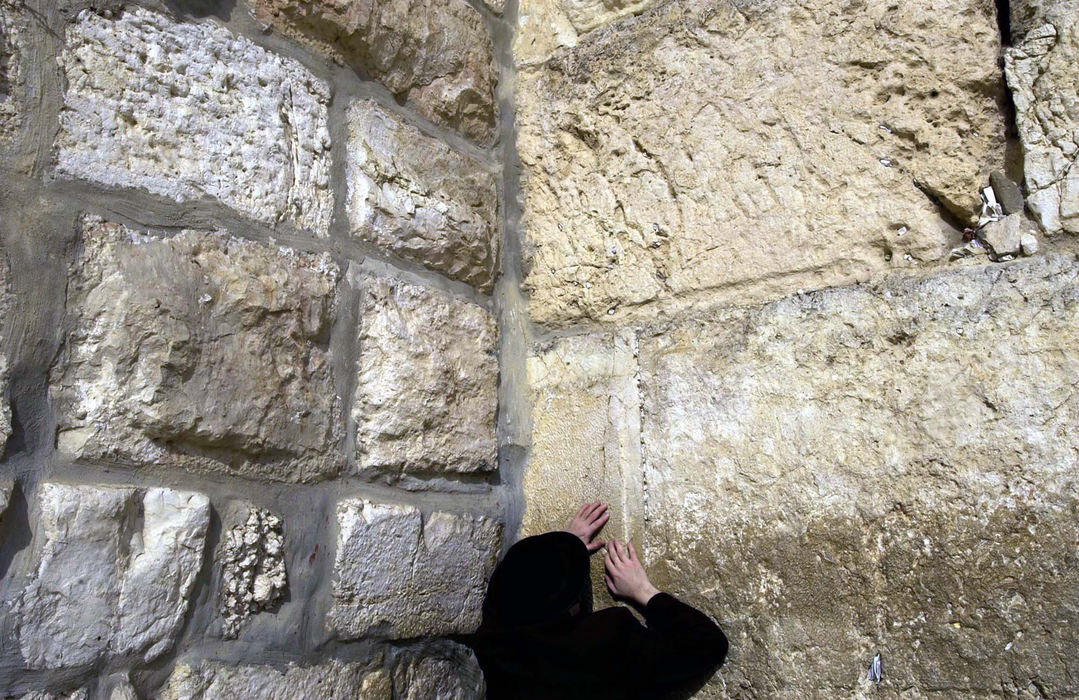 Third Place, Photographer of the Year - Dale Omori / The Plain DealerAn man prays at the Western Wall in the Old City of Jerusalem Friday, Oct. 25, 2002, Jerusalem Israel. 