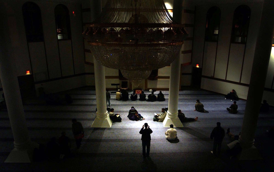 Third Place, Photographer of the Year - Dale Omori / The Plain DealerA man prays at the Islamic Center of Cleveland on the first day of Ramadon.