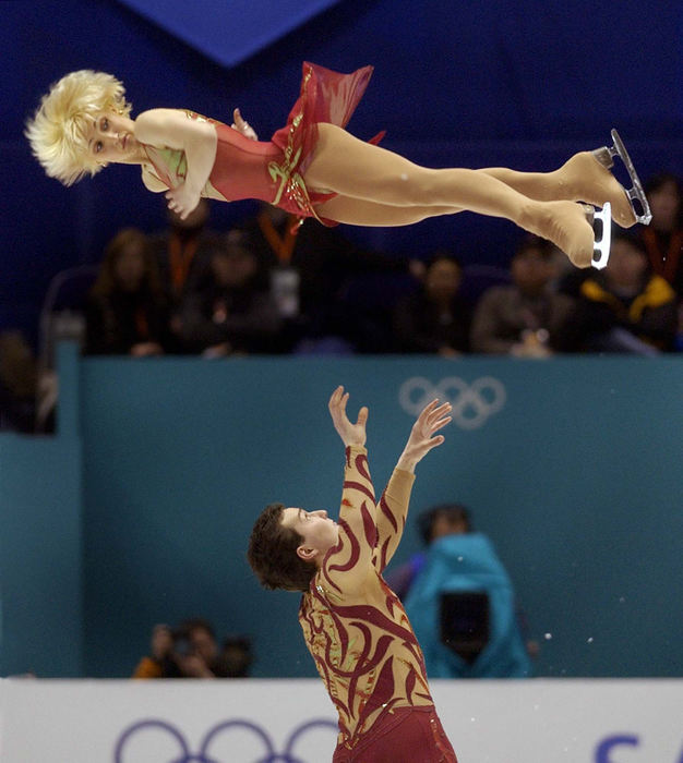 Award of Excellence, Photographer of the Year - Amy Sancetta / Associated PressAliona Savchenko and Stanislav Morozov of the Ukraine compete in the pairs short program during the Winter Olympics at the Salt Lake Ice Center in Salt Lake City, Feb. 9, 2002.