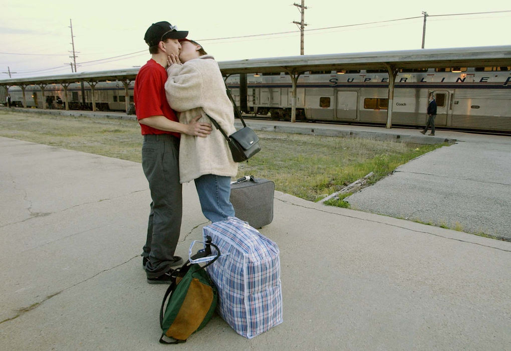 Award of Excellence, Photographer of the Year - Amy Sancetta / Associated PressMaegan Lee Andrezejewski , 20, kisses her fiancee Rodney Baker, 24, after debarking from the California Zephyr in Ottumwa, Iowa on April 22, 2002.  The two-day trip to on the train to visit her aunt in Illinois was Maegan's first time away from Rodney since their 7-month engagement.  When the train pulled into the station, Maegan exclaimed with delight "I'm home! I'm home! I'm home!"