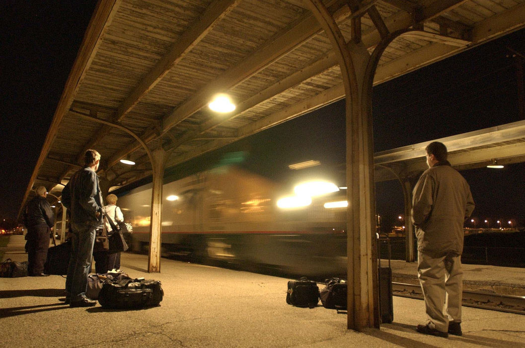 Award of Excellence, Photographer of the Year - Amy Sancetta / Associated PressPassengers wait as the westbound California Zephyr pulls into the station in Ottumwa, Iowa on the night of April 23, 2002.  