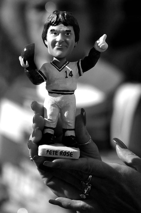 Award of Excellence, Photographer of the Year - Michael E. Keating / Cincinnati EnquirerRose, now a caricature of himself, is immortalized in bobblehead fashion.  A prized possession of fans...especially with fake nails and flashy diamonds.