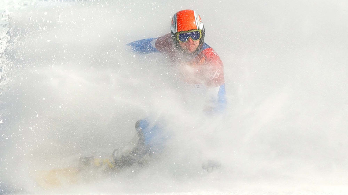 Second Place, Photographer of the Year - John Kuntz / The Plain DealerItaly's Walter Feichter skids to a stop spraying snow all around him as he turns to see the timer on his qualifying run in the men's parallel giant slalom snowboard February 14, 2002 at the Park City venue during the 2002 Winter Olympic Games.  Walter did qualify in the 11th position for tomorrows medals run. 