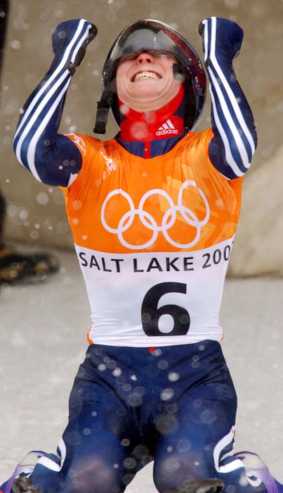 Second Place, Photographer of the Year - John Kuntz / The Plain DealerGreat Britain's Alex Commber celebrates her bronze medal run in the women's skeleton February 20, 2002. 