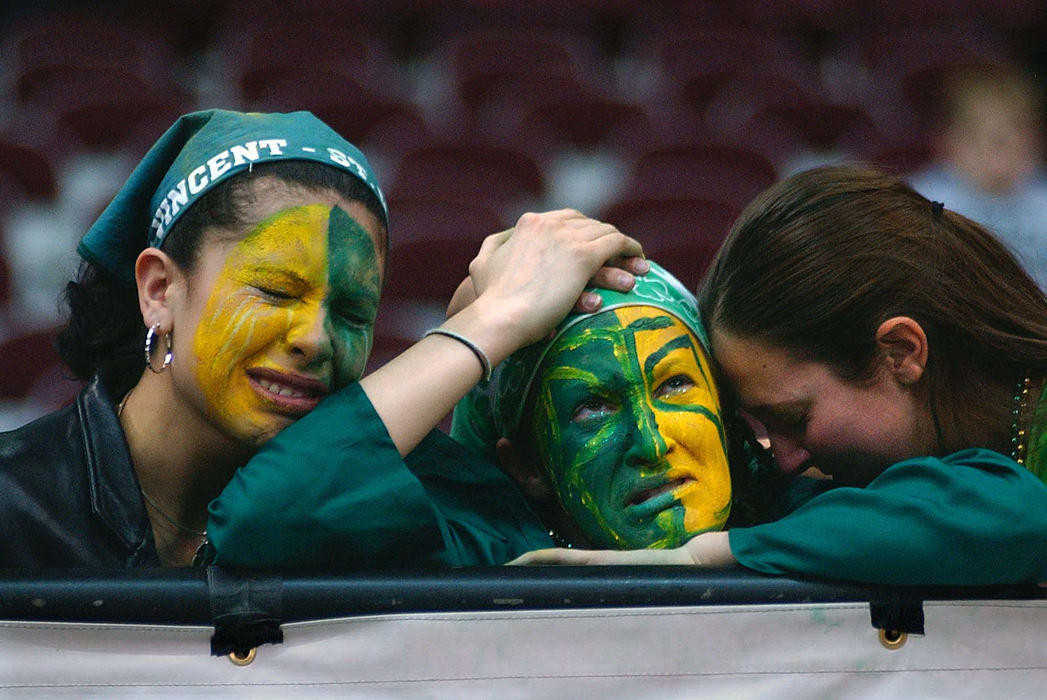 Award of Excellence, Sports Feature - Phil Masturzo / Akron Beacon JournalSt. Vincent-St. Mary fans Amanda Presz and Amy Clark feel the pain of the  team's 71-63 loss to Roger Bacon in the Division II State Final in Columbus.  