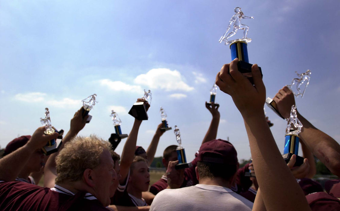 First Place, Student Photographer of the Year - James Patterson / Ohio UniversityColdren Crates coach Mike Kerns celebrates with his team after winning the Major Youth League Tournament Championship game in Findlay.