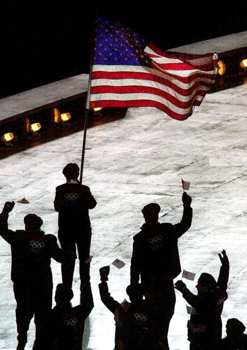 Second Place, Sports Picture Story - John Kuntz / The Plain DealerU.S. Olympic team parades in Opening Ceremony of 2002 Winter Olympic Games February 8, 2002 in Salt Lake City, Utah.   