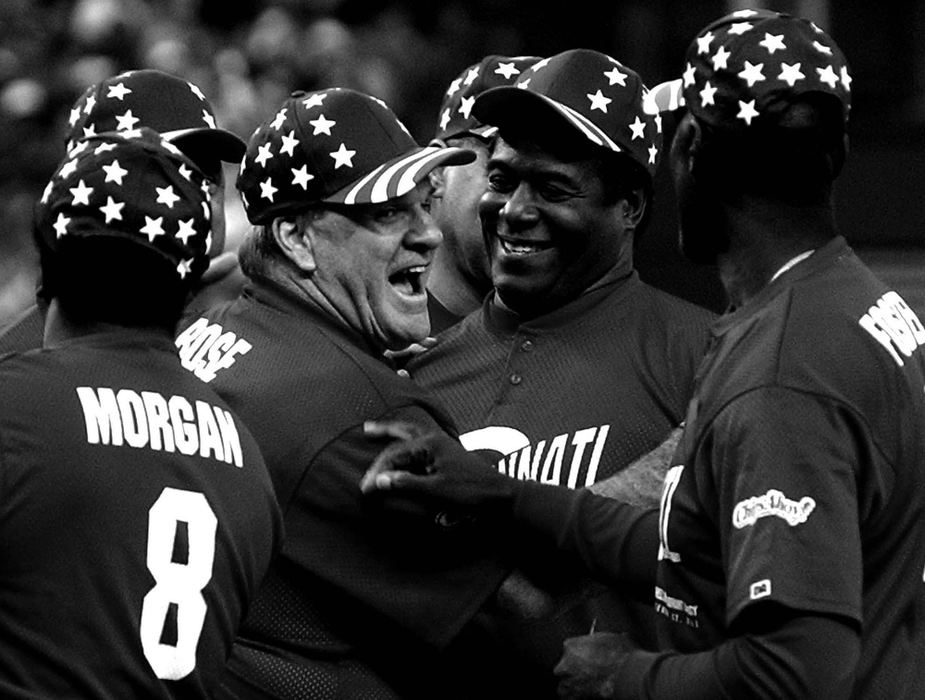 Third Place, Sports Picture Story - Michael E. Keating / Cincinnati EnquirerPete Rose is greeted heartily by old members of the Big Red Machine during introductions.