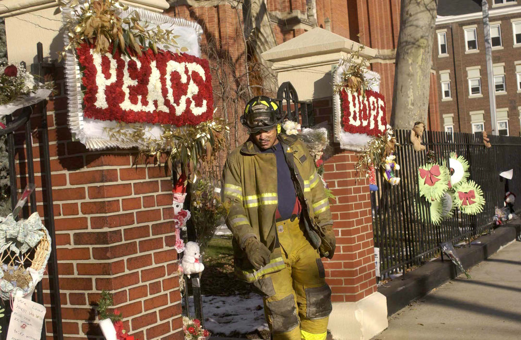 Second Place, Team Picture Story - Lynn Ischay / The Plain DealerThe day after the murder and fire at the St. Stanislaus rectory, Cleveland police and firefighters continued their investigation.  Police still had not found the murder weapon.