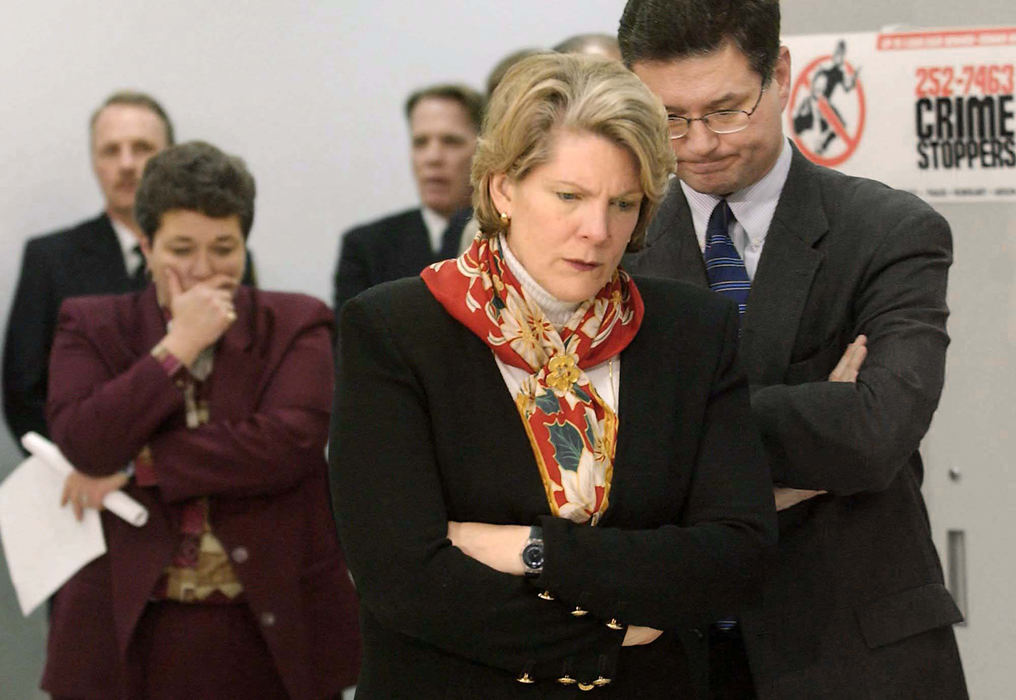 Second Place, Team Picture Story - Marvin Fong / The Plain DealerA shocked Cleveland Mayor Jane Campbell and staff members listen as Police Chief Edward Lohn informs the media about the arrest of Daniel Montgomery in the death of Father William Gulas.