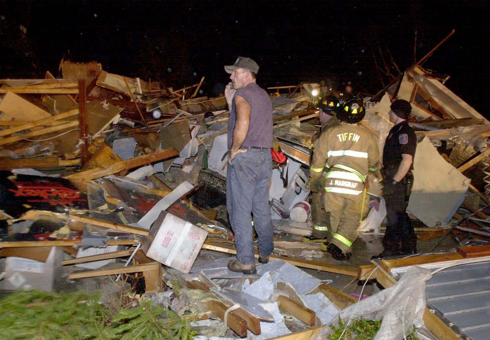 Third Place, Team Picture Story - Allan Detrich / The BladeDave Sauber stands in the wreckage of his home on TR 1177, after a tornado moved through the south part of Tiffin.