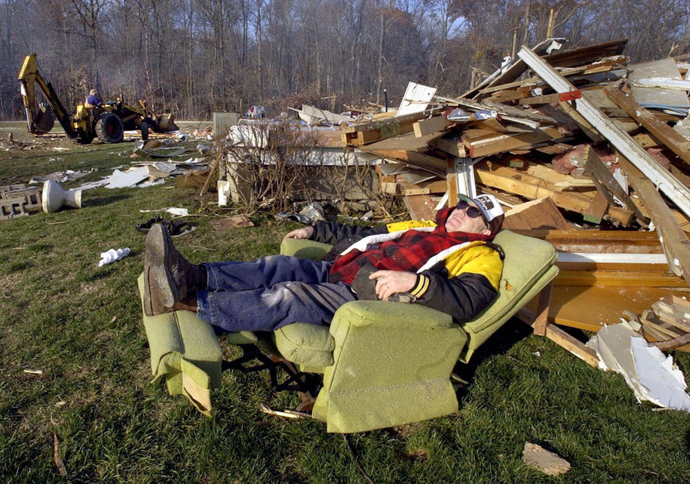 Third Place, Team Picture Story - Andy Morrison / The BladeRalph Shields takes a break from cleaning up his demolished Van Wert home to sit in his favorite chair. He and wife Grace survived the tornado in the basement of the Zook Road home he built in 1964.