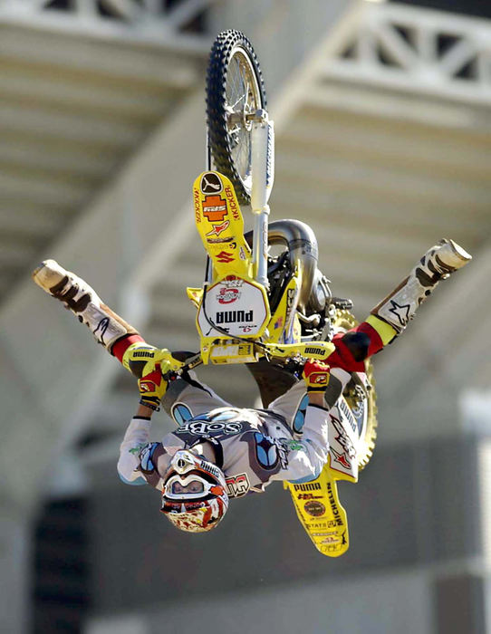 First Place, Team Picture Story - Jonathan J. Romano / The Plain DealerTravis Pastrana steals the show with his winning backflips during the Freestyle Motorcross Finals. 