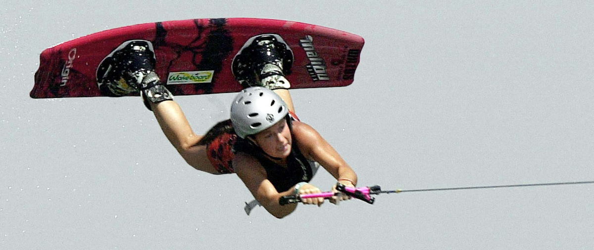 First Place, Team Picture Story - John Kuntz / The Plain DealerThere is some water below wakeboarder Laura Lohmann, but right now she's catching only air after hitting a wave and doing a flip.