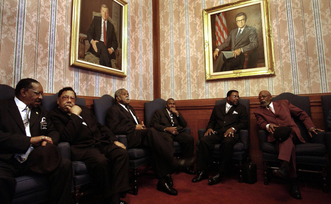 Award of Excellence, General News - Dale Omori / The Plain DealerMembers of the Baptist Ministers Conference of Cleveland and Vicinity wait at City Hall to talk with Public Safety Director James Draper about complaints of discriminatory promotion methods in the Police Department. 