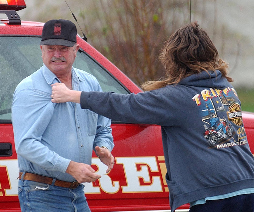 Second Place, News Picture Story - Carrie Cochran / Pulse-JournalJay Fisher, father in-law of Donald Haury, age 50 of Bellbrook, Ohio reacts right after Haury's sister-in-law Pamela Short tells him that Donald was fatally shot Thursday morning at Watkins Motor Lines, Inc. on Centre Park Drive in West Chester Township.  Tom West surrendered to police at a truck stop in Indiana hours later. The shooting left three wounded and two dead.