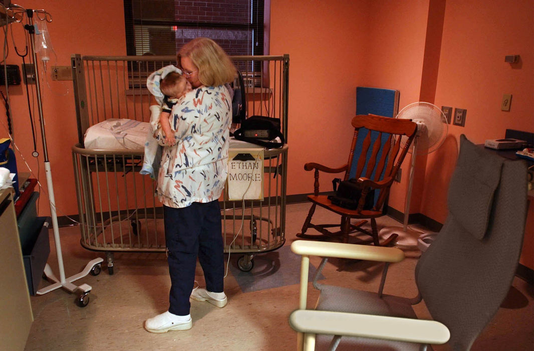 Second Place, Ohio Understanding Award - Bob DeMay / Akron Beacon Journal"He needs to go home," nurse Cherly Laws says as she cradles Ethan in her arms on his last morning in the NICU. "It's definitely time."